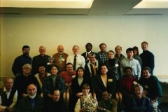 Participants of the 1995 East St. Louis Syntegration on Old Man River City, attended by State Rep. Wyvetter Younge (center row, third from left). The event was organized by Dr. Bill Perk, who studied under design scientist Bucky Fuller, who along with Rep. Younge and dancer-humanitarian Katherine Dunham, conceived of Old Man River City.