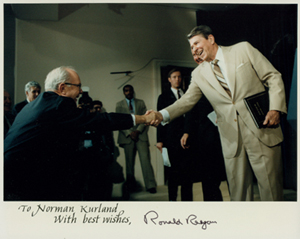 Russell Long greets Ronald Reagan at Project Economic Justice Task Force Report